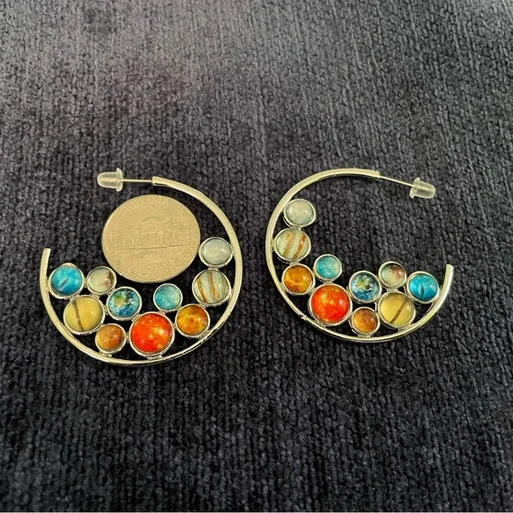 Silver tone and fun jewel colors in a pair of hoop earrings perfect for summer! - Picture 2 of 4